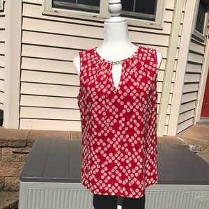 Trina Turk sleeveless top.  Red/white with decorative gold chain at neckline